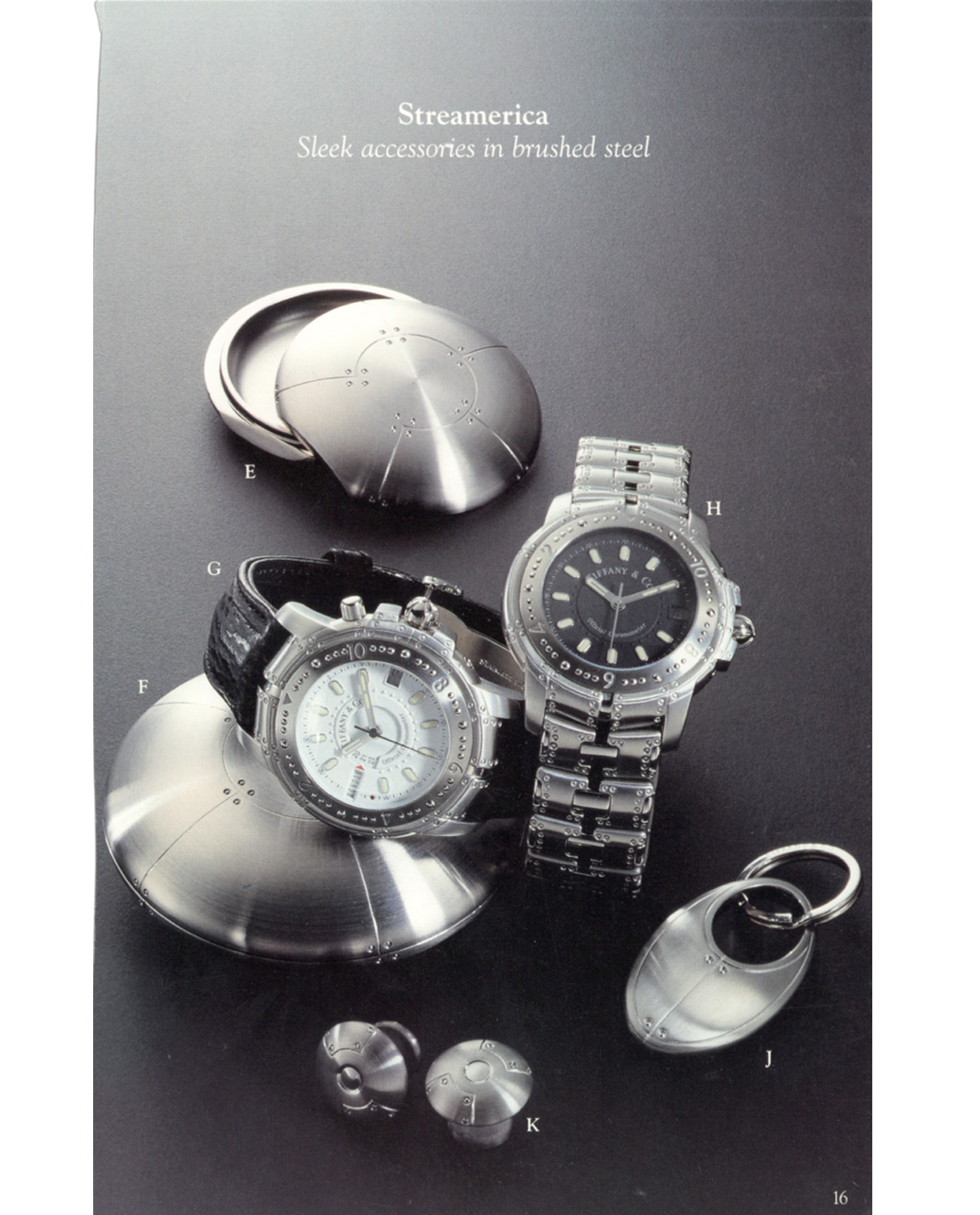 Tiffany & Co. Blue Book Catalog from the late 90's Sleek accessories in brushed steel Streamerica Collection: Perisphere Nesting Boxes, the World Timer Automatic Watch with white face and leather band, the Automatic Chronometer, geodome cufflinks, Curviline key ring.