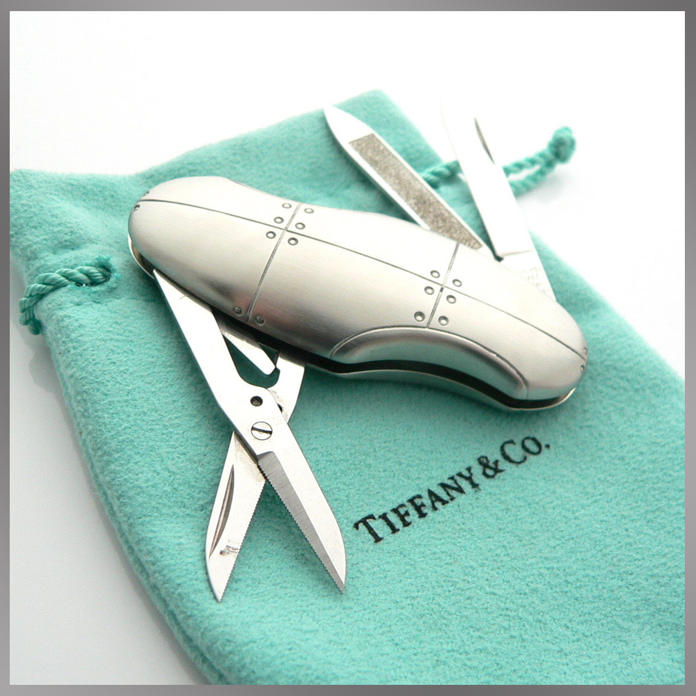 Small Tiffany & and Co. Streamerica Carapace Pocket Knife Stainless Steel Swiss Made Switzerland 3 Tools nail file scissors knife blade